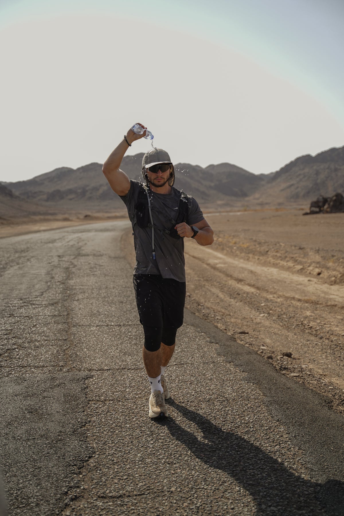 Deenathletic Athlete Okan Akbalik Running in Desert